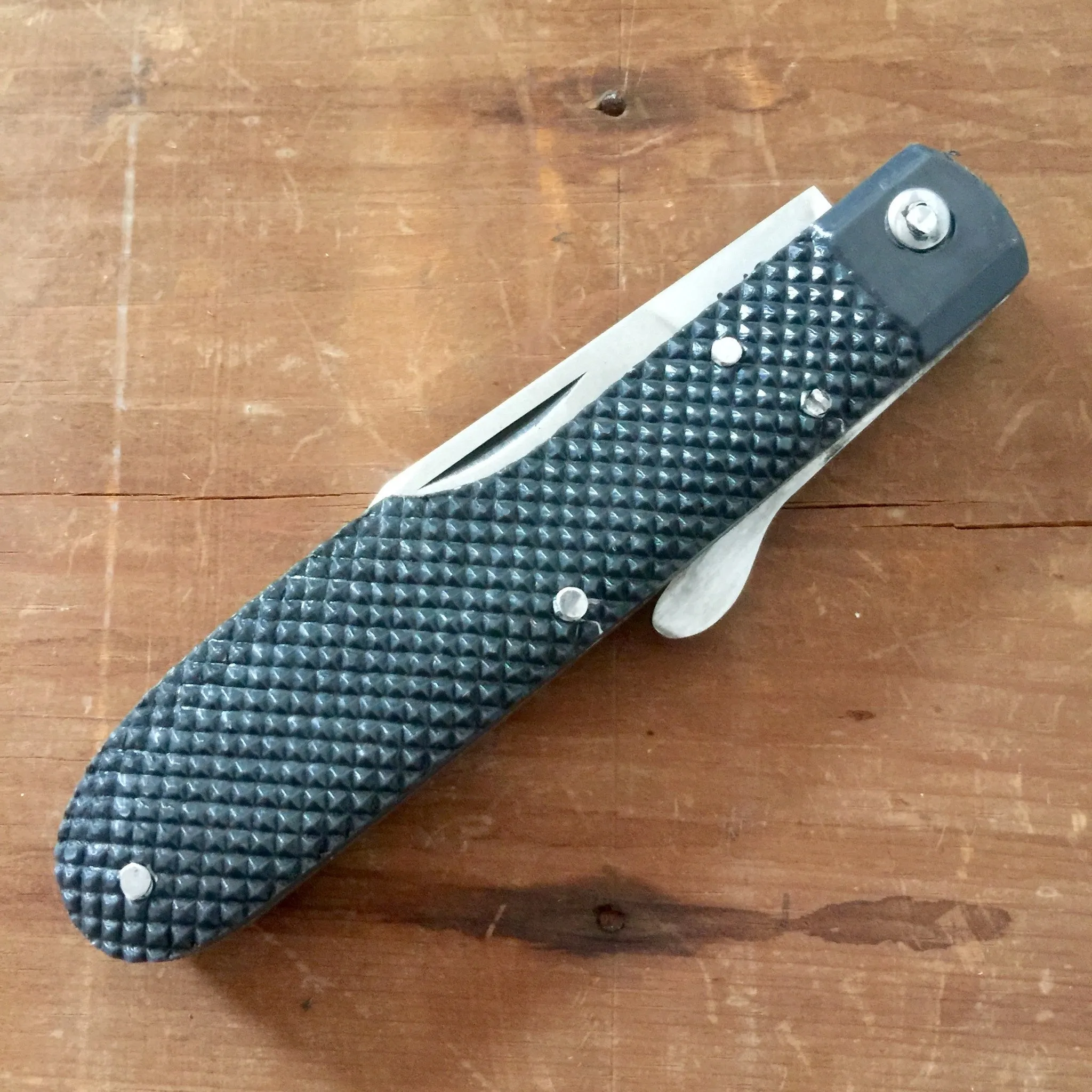 A Wright & Son Sheffield WW2 Issue Pattern 4 5/8" Clip Point Carbon Lockback Black Composite Handle